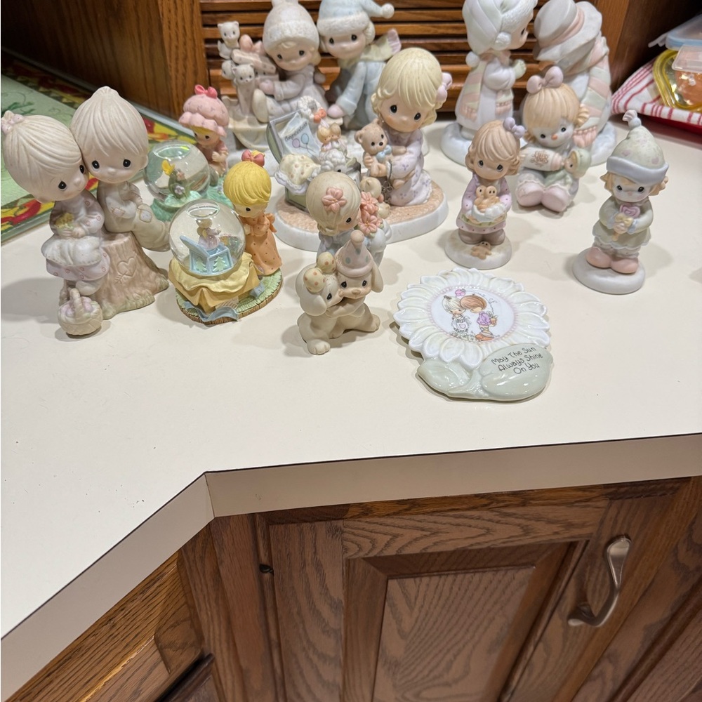 Precious Moments Cream and Pastel Figurine Collection